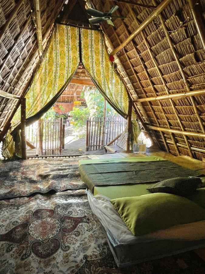 Tribal Huts Community Vandrerhjem Daanbantayan Eksteriør bilde