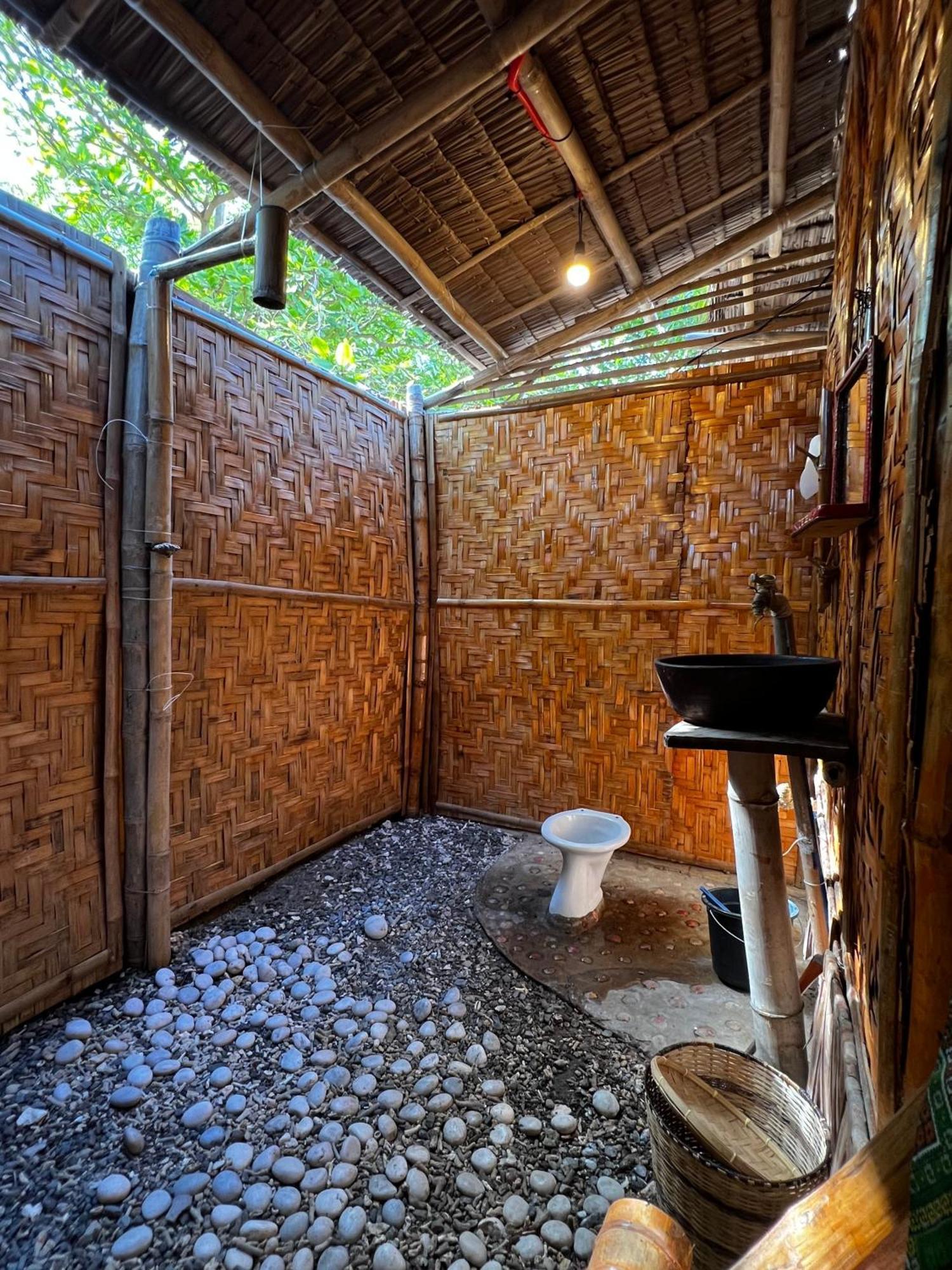 Tribal Huts Community Vandrerhjem Daanbantayan Rom bilde