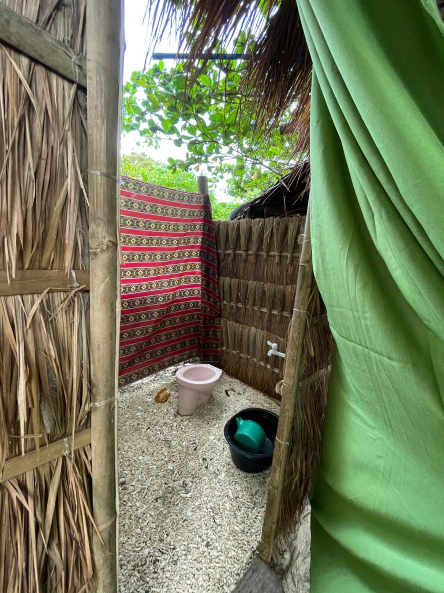 Tribal Huts Community Vandrerhjem Daanbantayan Rom bilde